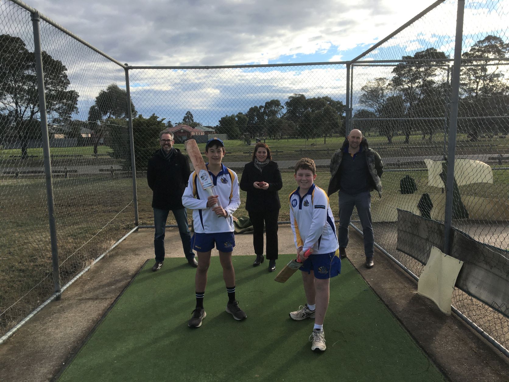 Back, from left: City of Ballarat Cr Ben Taylor, Member for Wendouree Juliana Addison MP, VRI Delacombe CC Junior Coordinator Danyel Attard. Front, from left: Zane Attard and Logan Attard at Doug Dean Reserve cricket nets