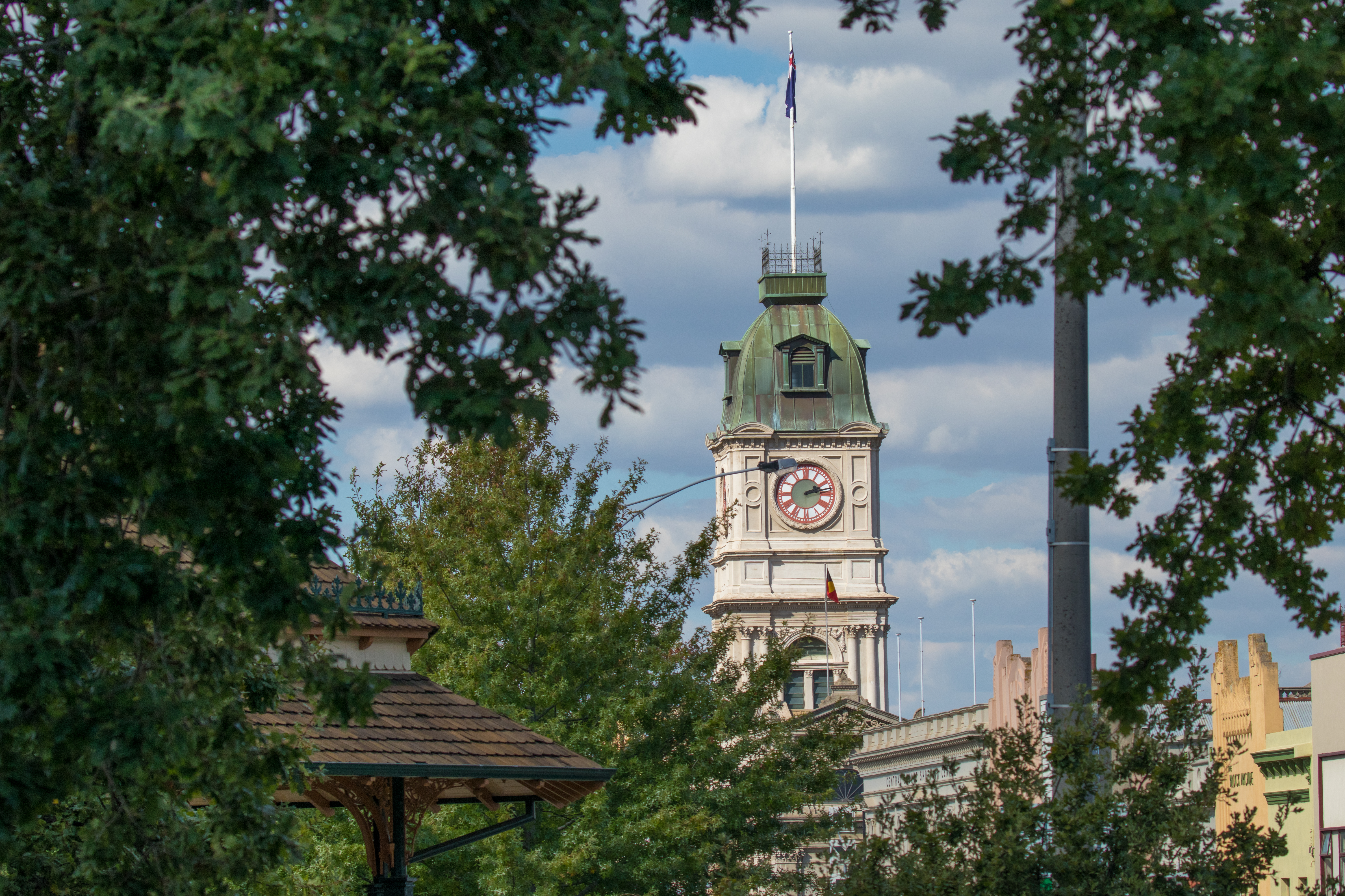 Generic photo of Town Hall in the distance with greenery