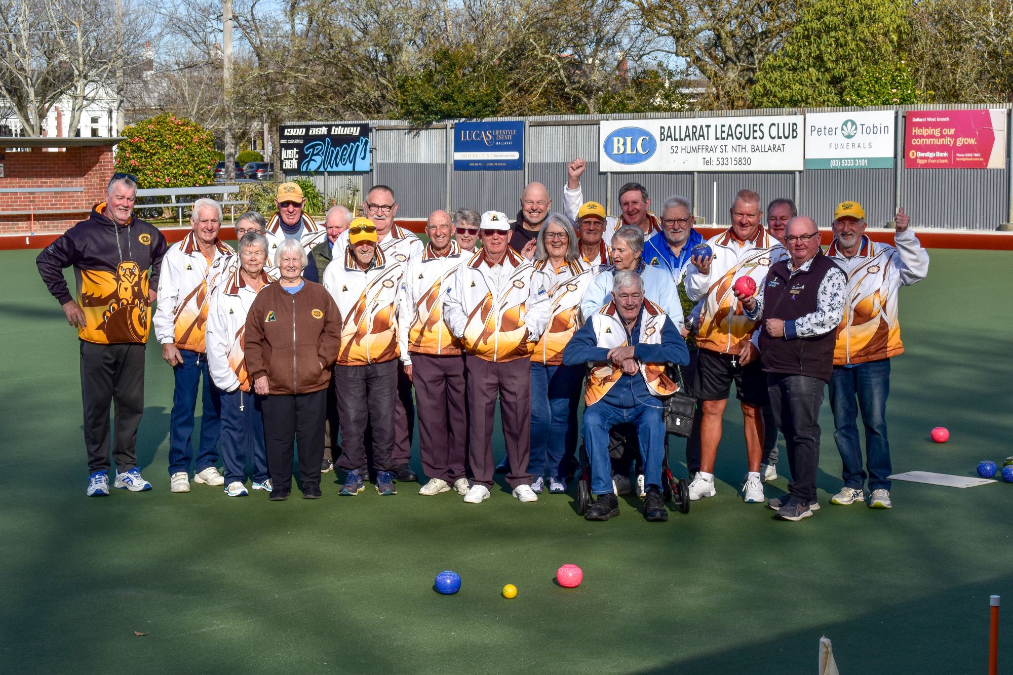 Members of the City Oval Bowling Club with City of Ballarat Mayor, Cr Des Hudson celebrating the official opening of new synthetic green.