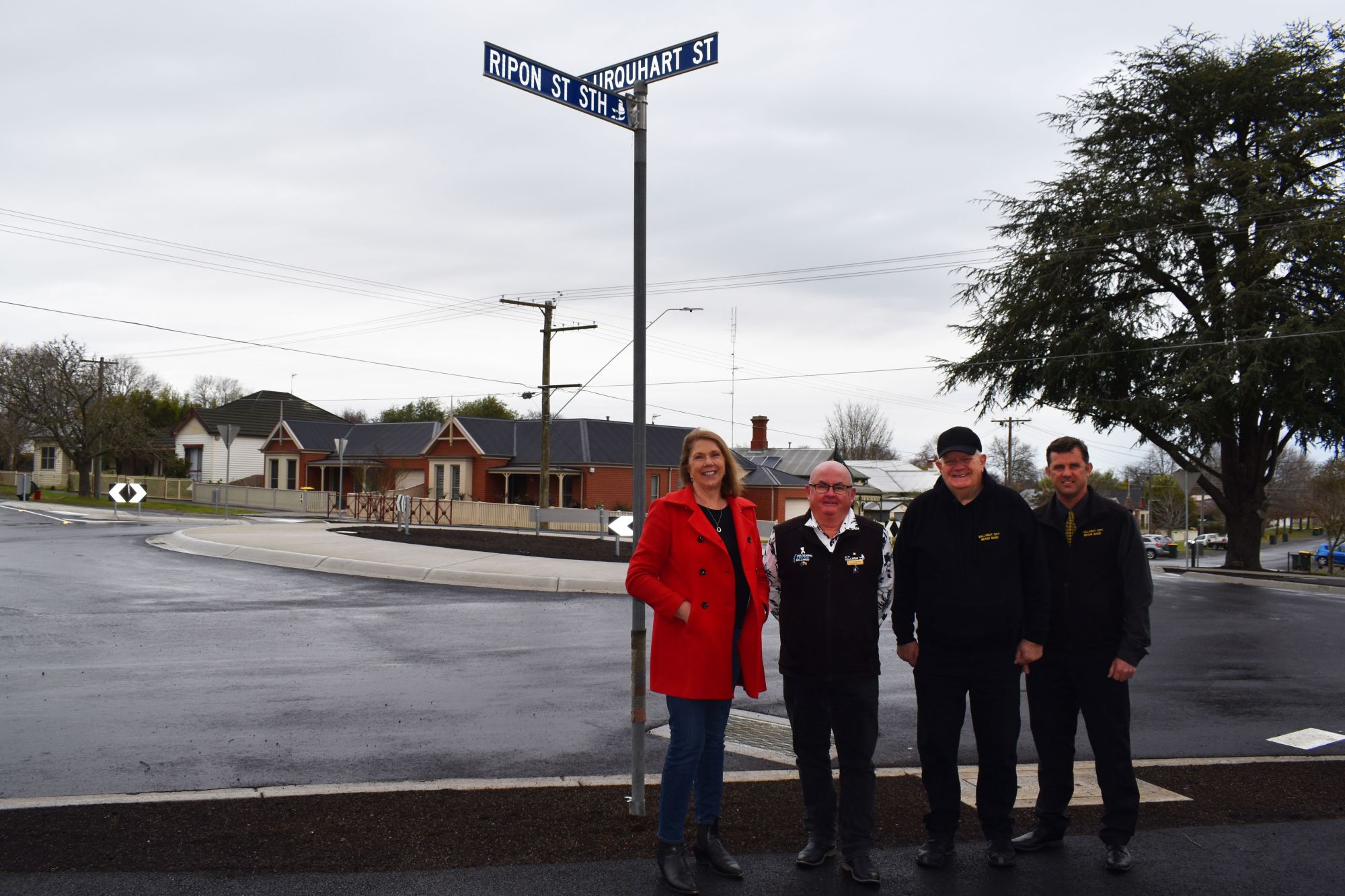 Member for Ballarat Catherine King, City of Ballarat Mayor, Cr Des Hudson and Ballarat Brass Band members Chris Ducardus and Tony Vanderkley at the new roundabout.