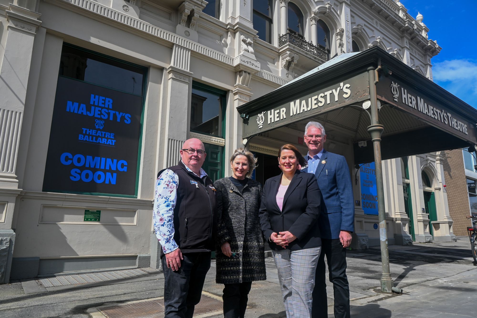 Photo of Mayor with Government representatives in front of Her Majesty's Theatre