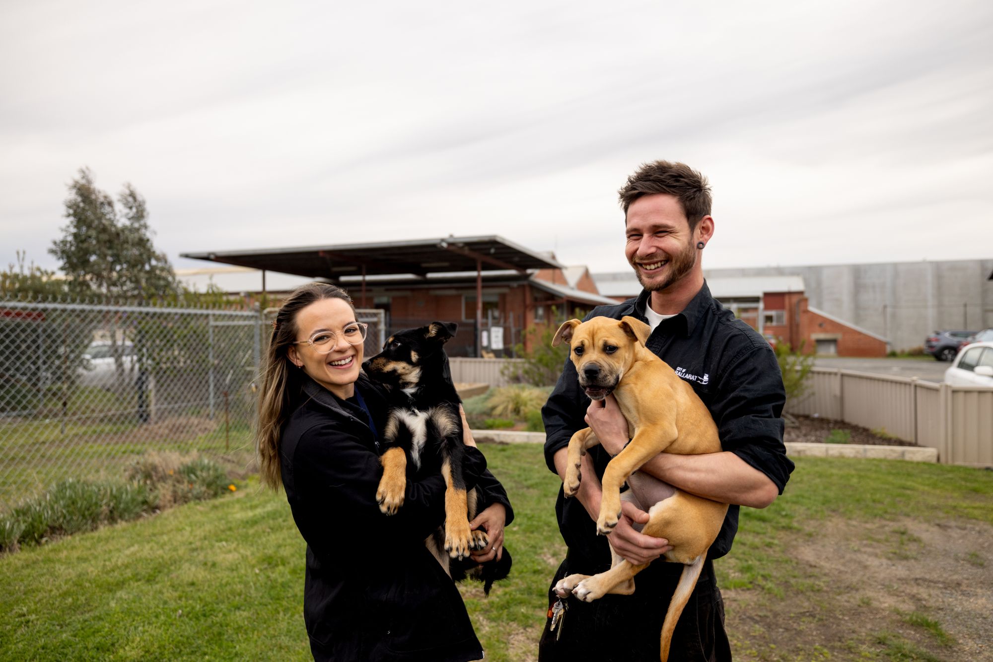 Generic image of Animal Shelter staff and dogs at the Animal Shelter