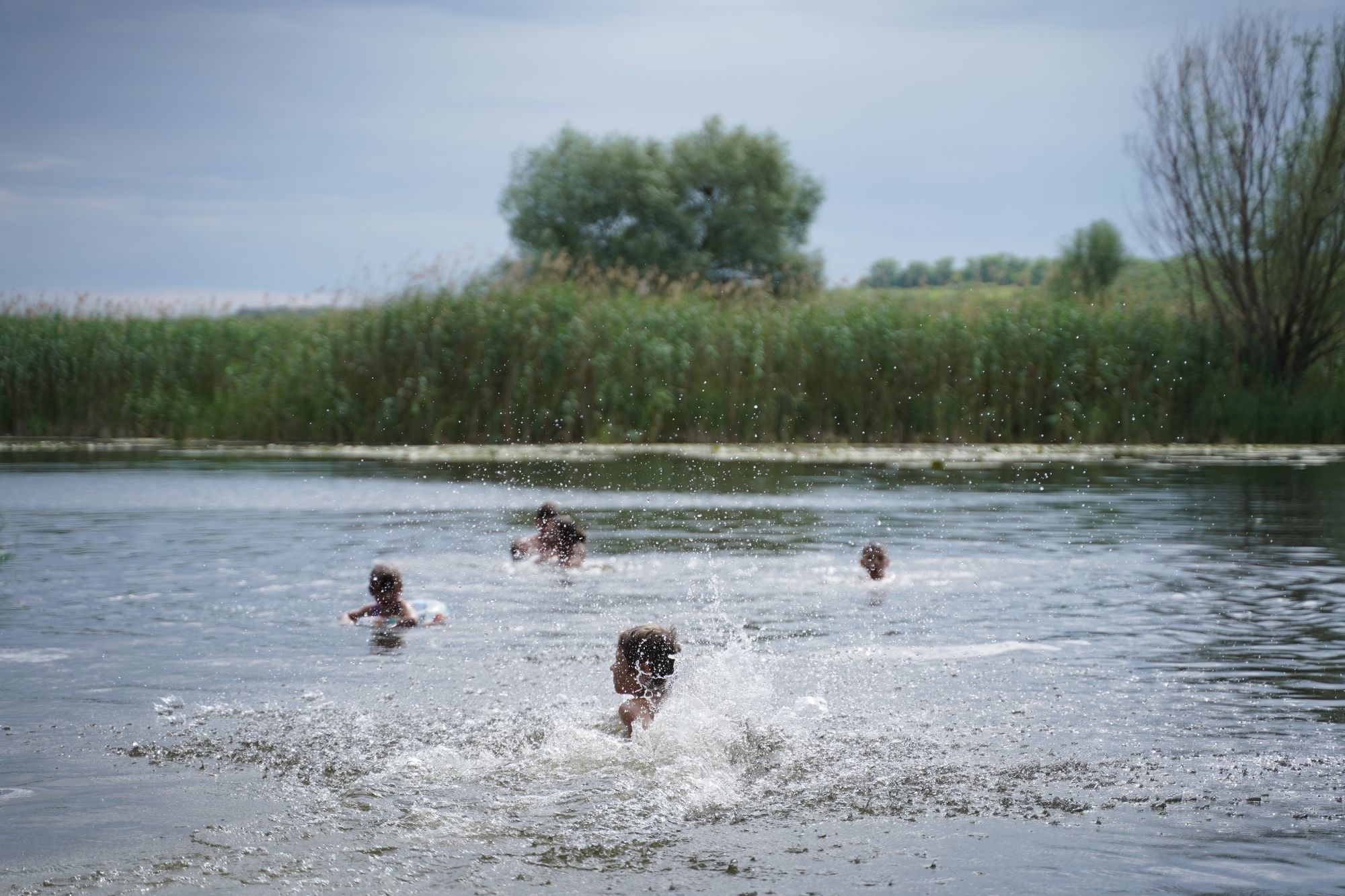 Generic image of children playing in a lake