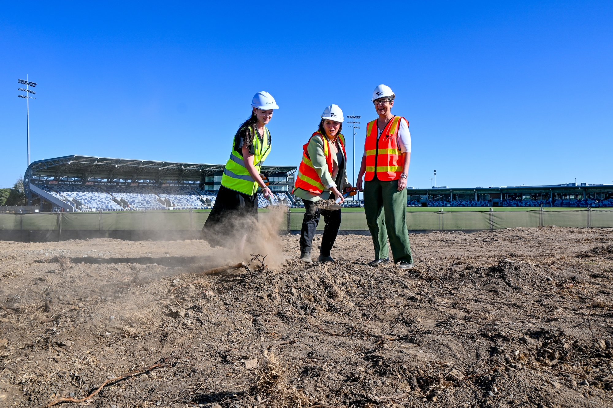 City of Ballarat Mayor, Cr Tracey Hargreaves, Member for Wendouree Juliana Addison and Member for Eureka Michaela Settle turn the first sod on the Ballarat Major Events Precinct development.