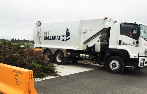 A City of Ballarat waste collection vehicle with green waste
