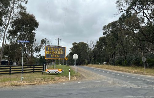 Finchs Road intersection with Video Messaging Sign advising of works.