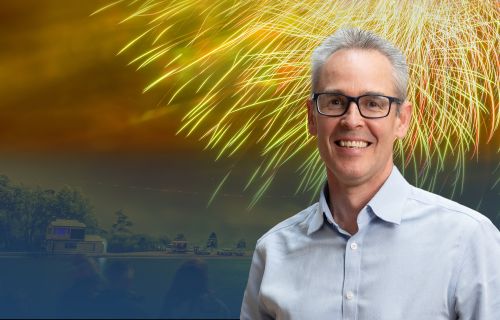 Image of Deputy Mayor Cr Ben Taylor in front of the fireworks display at Lake Wendouree