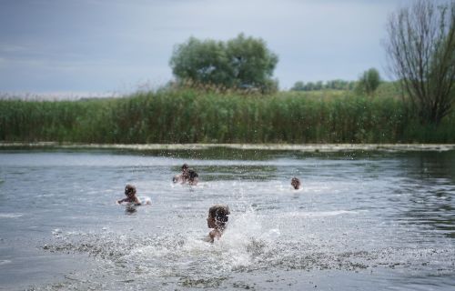 Generic image of children playing in a lake