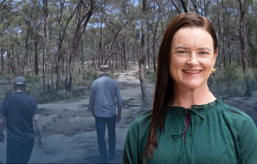 Image of Mayor Cr Tracey Hargreaves in front of the Victorian Goldfields landscape