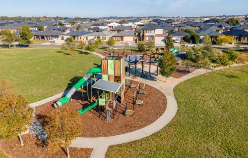 aerial image overlooking new suburb and community playground