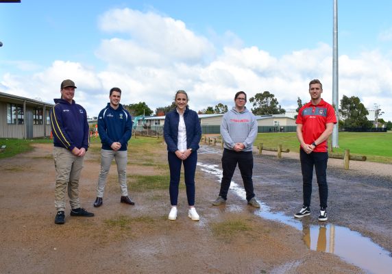 Cr Johnson with rugby and cricket club representatives