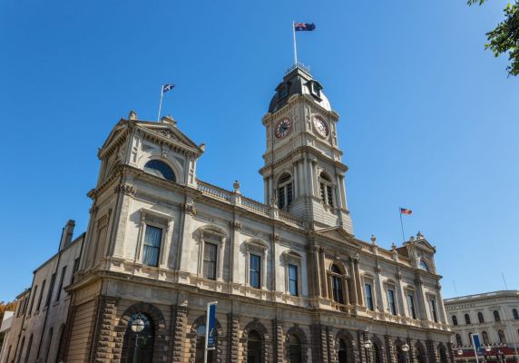 Ballarat Town Hall stands against a clear blue sky. 