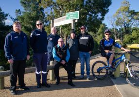 Cr Des Hudson with Ambulance Victoria and members of the mountain biking club