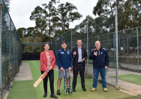 Member for Buninyong, Michaela Settle, Mt Clear Cricket Club representative, City of Ballarat Mayor, Cr Daniel Moloney and Mt Clear Cricket Club president Anthony Tigchelaar standing at the old cricket nets to be replaced