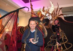 Ballarat Mayor Cr Daniel Moloney with Jeffrey the snake and Beyond Dark characters from Ballarat Winter Festival