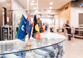 Torres Strait Flag, Australian Flag, Aboriginal Flag on desk at BALC