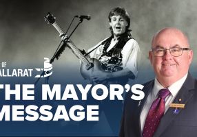 Text with The Mayor's Message with an image of Mayor Cr Des Hudson in front of an image of Paul McCartney
