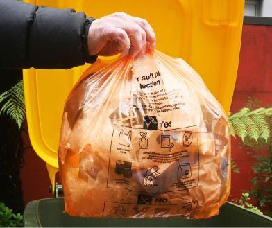 image of the new City of Ballarat supplied orange bag to be used in the pilot program